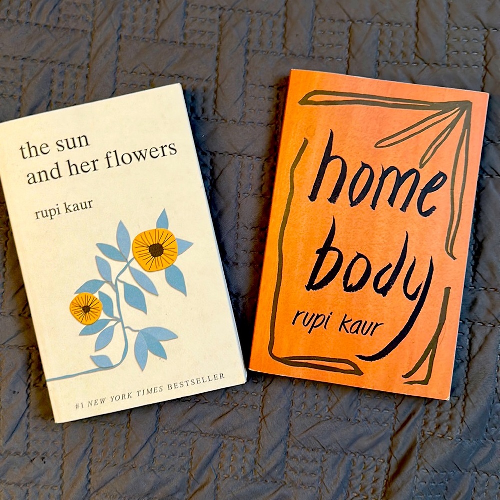 “Home Body” and “the sun and her flowers” paperback Rupi Kaur poem books